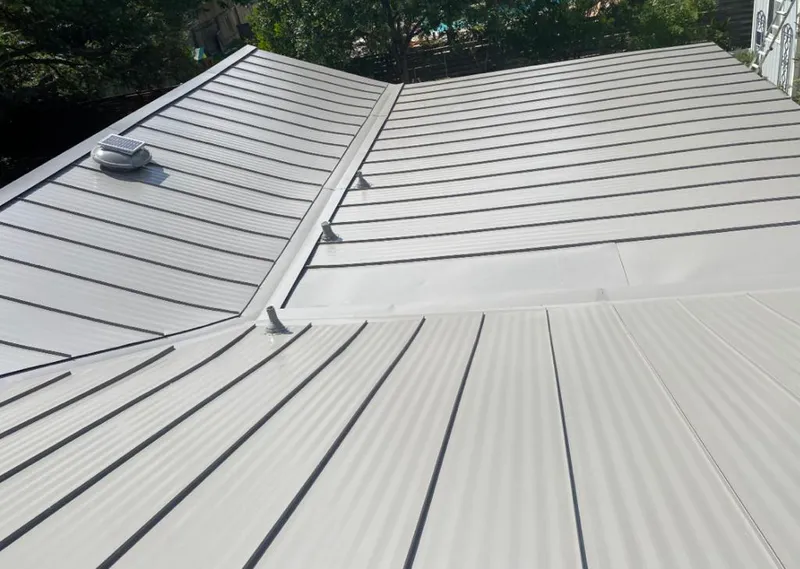 Solar attic fan installed on a metal roof for Roof Ventilation in North Laurel